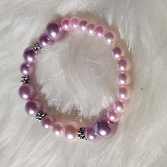 Handcrafted beaded bracelet made on a stretchy cord - Picture 3 of 4